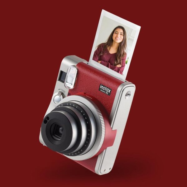 Accepts INSTAX Mini Instant Film Produces Credit Card-Sized Prints FUJINON 60mm f/12.7 Lens Optical Viewfinder with Target Spot Built-In Flash with Party Mode Bulb and Double Exposure Functions Kids, Landscape, and Macro Modes Manual Brightness Adjustment Tripod Mount and Rechargeable Battery